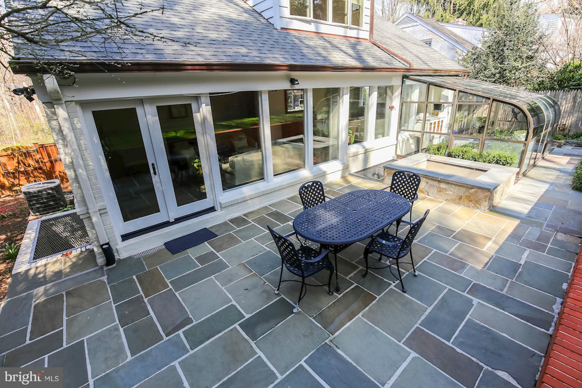 2347 49th Street Northwest Washington, DC 20007 - Photo 16 of 29 a view of a patio with a table and chairs