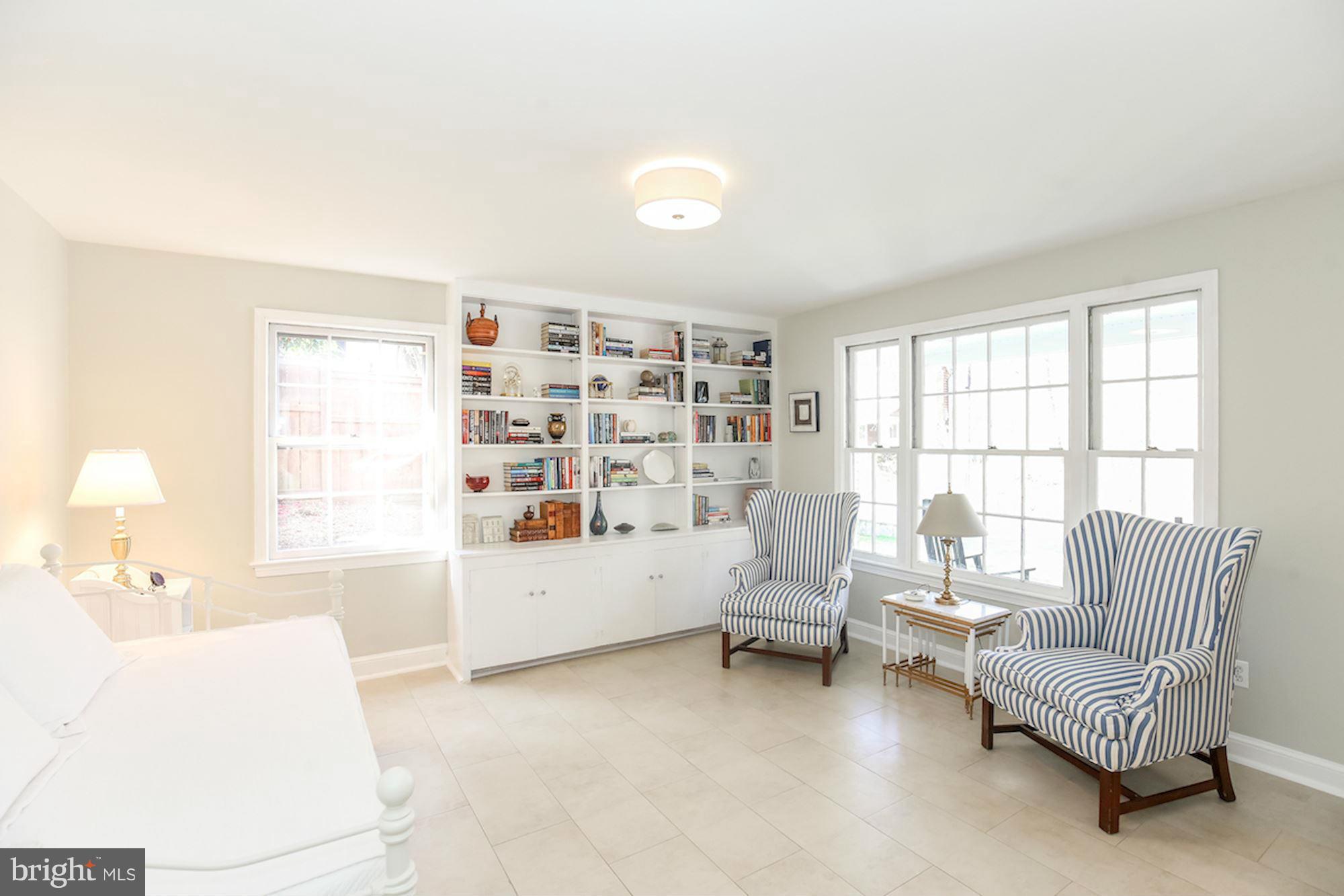 2347 49th Street Northwest Washington, DC 20007 - Photo 24 of 29 a living room with furniture and a large window