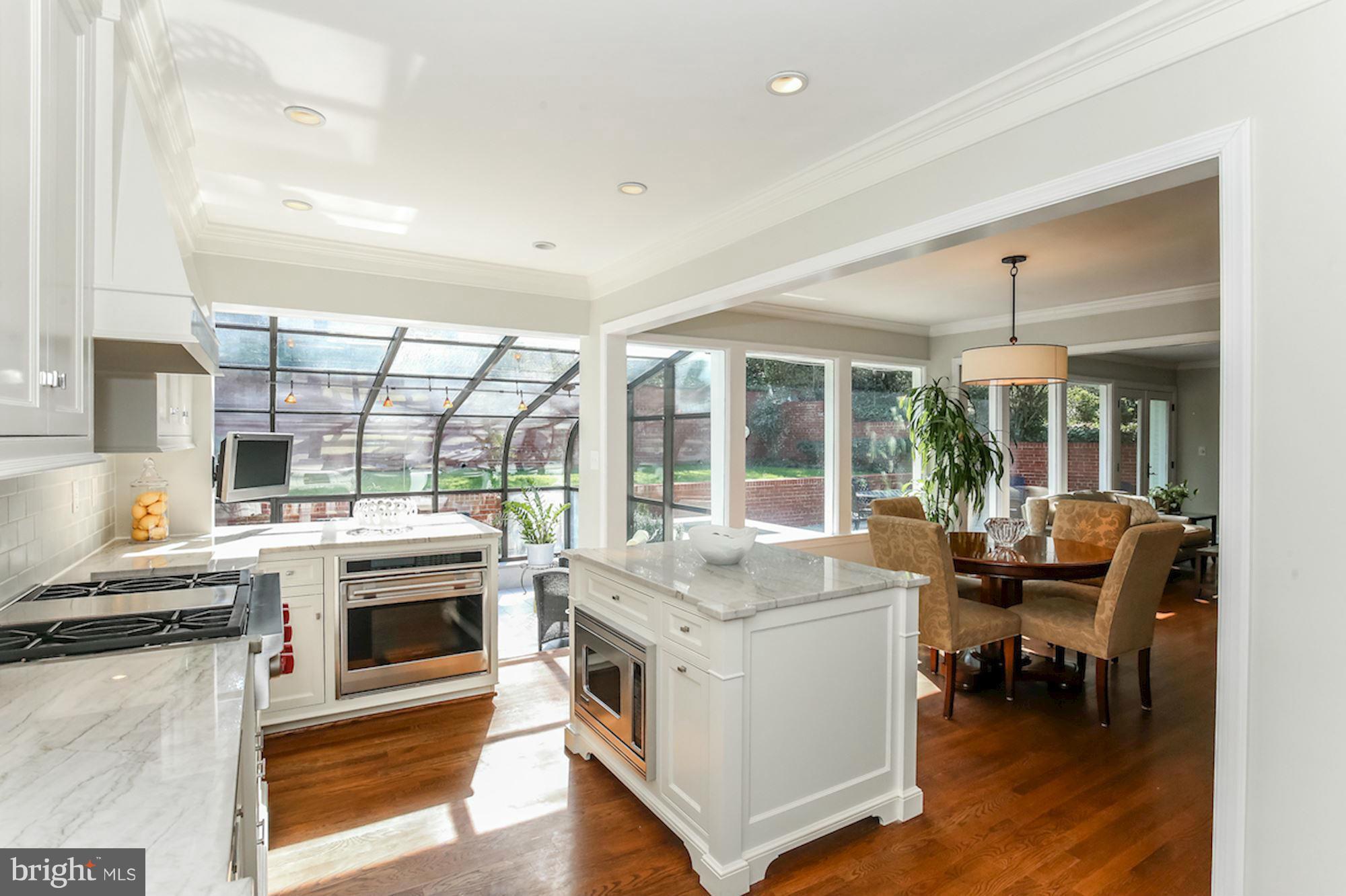 2347 49th Street Northwest Washington, DC 20007 - Photo 8 of 29 a kitchen with a stove and a microwave