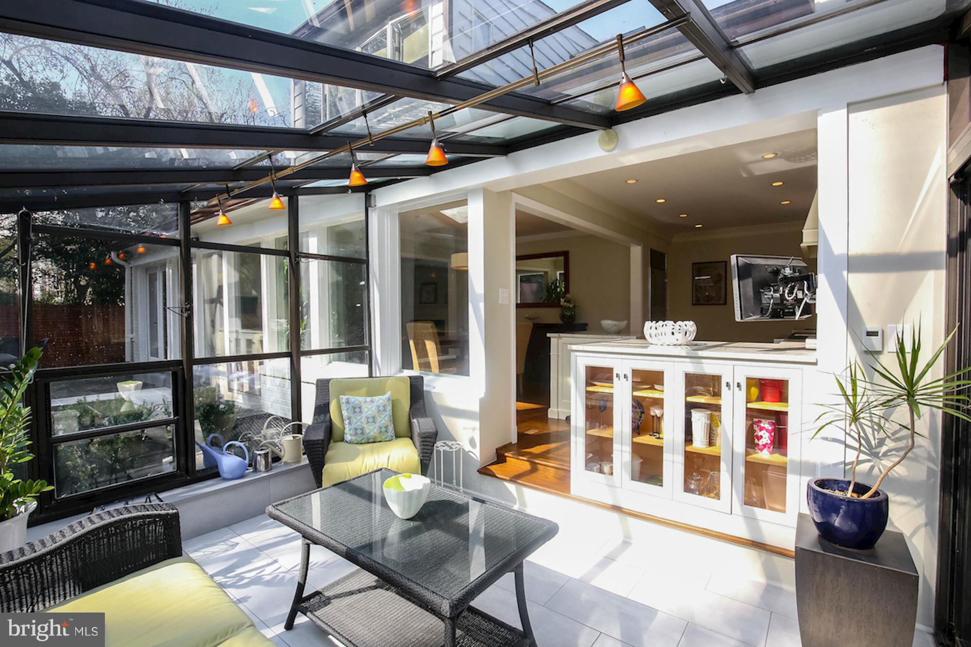 2347 49th Street Northwest Washington, DC 20007 - Photo 10 of 29 a view of a porch with furniture