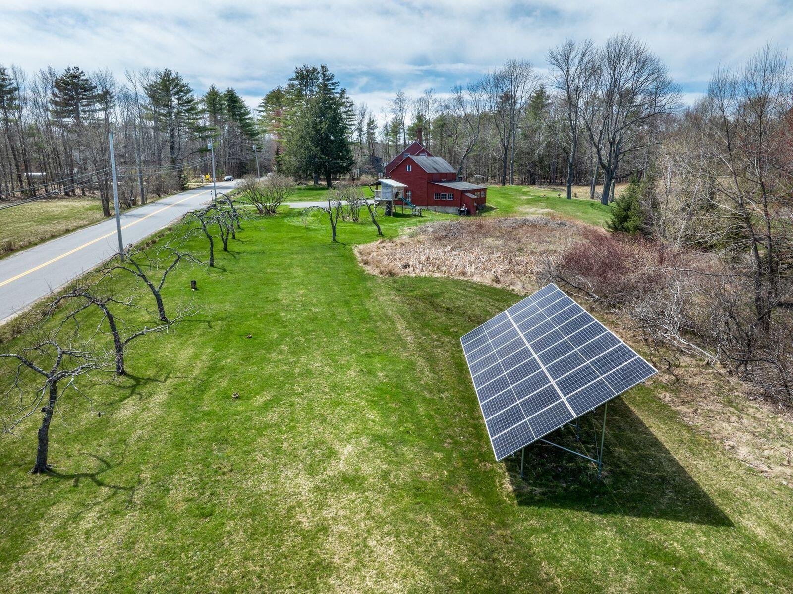 676 Cathance Road Topsham, ME 04086 - Photo 5 of 34 676 Cathance aerial solar panels to hous