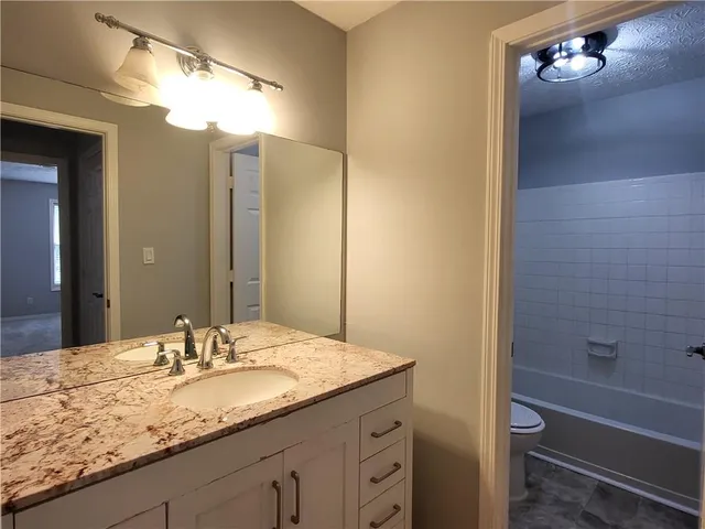 a view of balcony with wooden floor and outdoor space