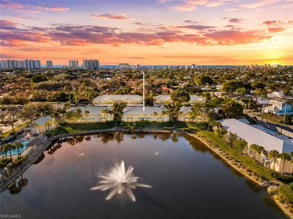 a view of a lake with a city