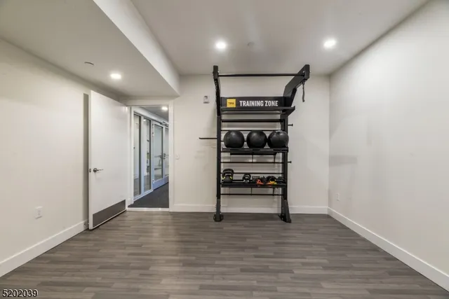 a view of entryway with wooden floor