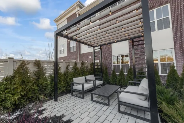 a view of patio filled with furniture