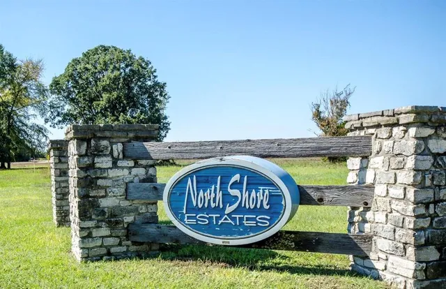 a view of swimming pool a garden and outdoor seating
