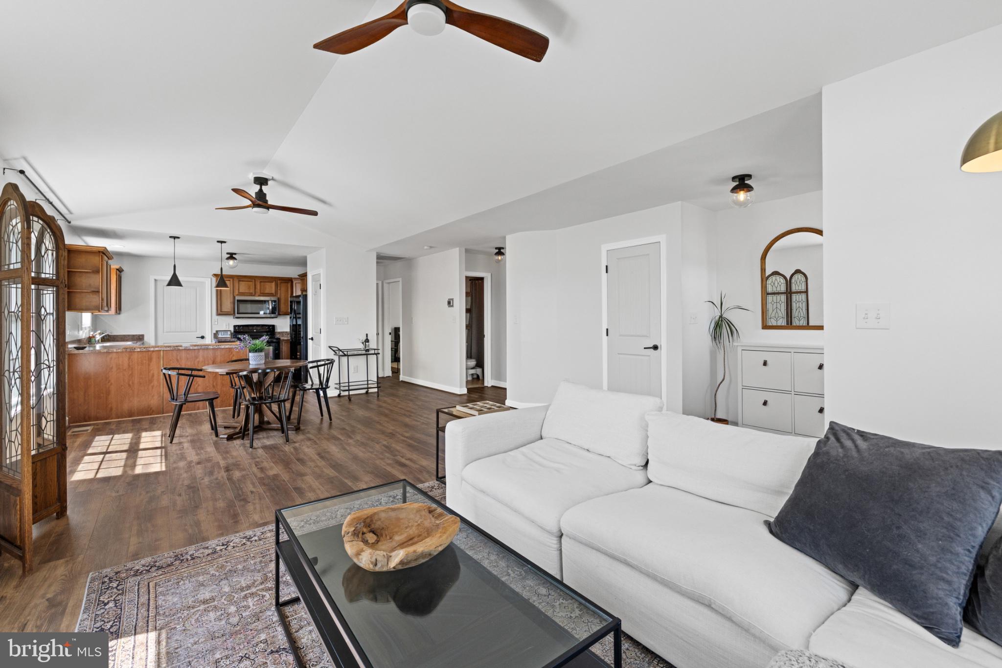 1523 Bowie Road Colonial Beach, VA 22443 - Photo 9 of 34 a living room with furniture and wooden floor