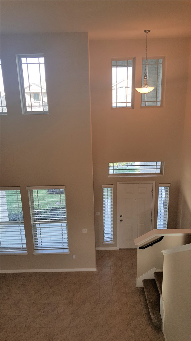 1509 Hamiltons Way Leander, TX 78641 - Photo 19 of 34 entry and family room as seen from loft area