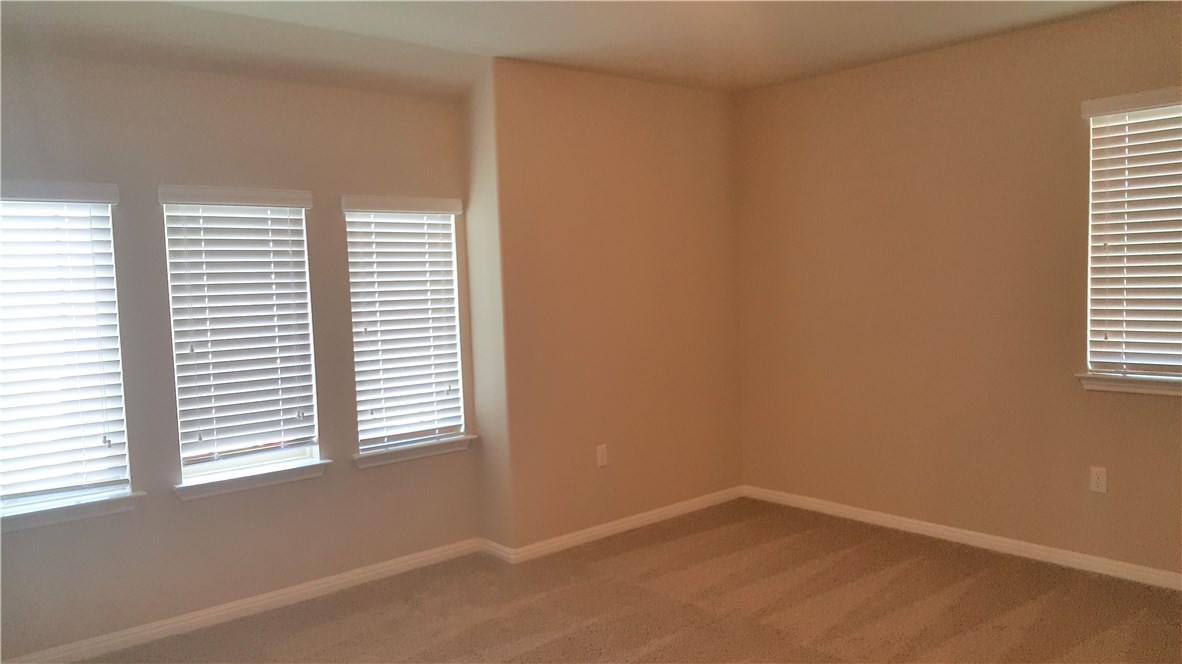1509 Hamiltons Way Leander, TX 78641 - Photo 26 of 34 large guest bedroom 2 with lots of windows