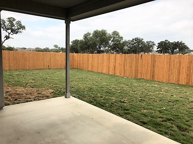 1509 Hamiltons Way Leander, TX 78641 - Photo 31 of 34 backyard with covered patio