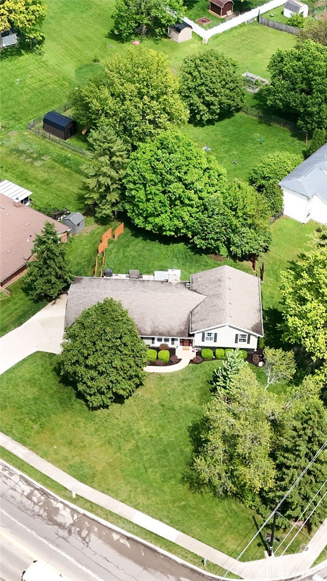 8916 Paragon Road Dayton, OH 45458 - Photo 3 of 33 Aerial view of a home with ample outdoor space and mature landscaping.