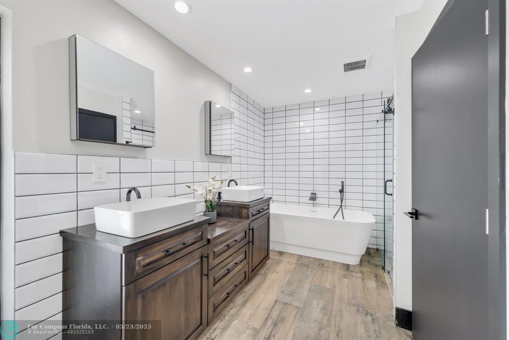 17531 Southwest 68th Court Southwest Ranches, FL 33331 - Photo 20 of 59 a bathroom with a sink and a bathtub