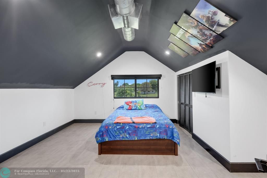 17531 Southwest 68th Court Southwest Ranches, FL 33331 - Photo 24 of 59 a living room with furniture fireplace and flat screen tv