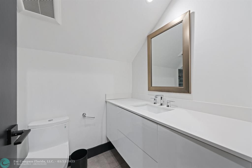 17531 Southwest 68th Court Southwest Ranches, FL 33331 - Photo 31 of 59 a bathroom with a sink and a mirror