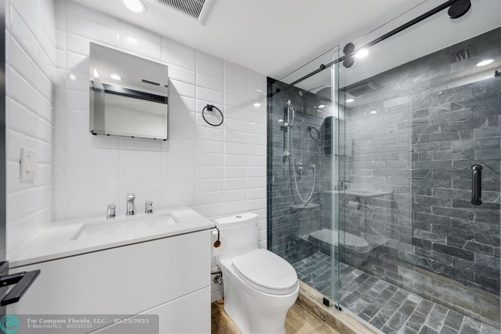 17531 Southwest 68th Court Southwest Ranches, FL 33331 - Photo 39 of 59 a bathroom with a sink toilet and shower