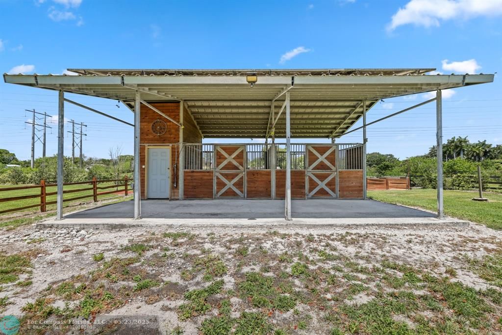 17531 Southwest 68th Court Southwest Ranches, FL 33331 - Photo 55 of 59 a view of street with yellow house