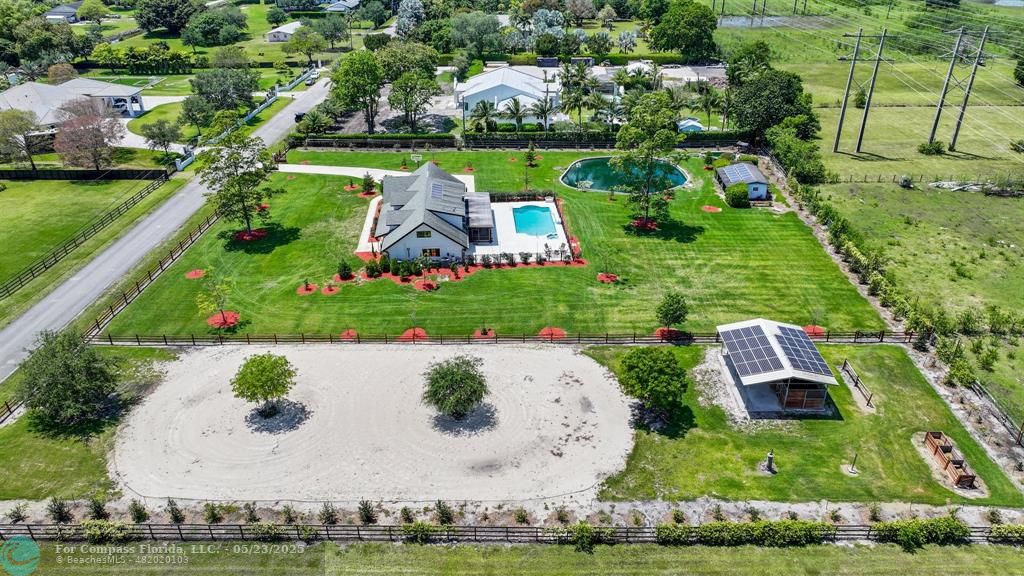 17531 Southwest 68th Court Southwest Ranches, FL 33331 - Photo 59 of 59 an aerial view of a house with outdoor space and street view