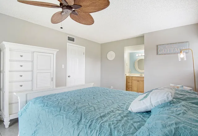 a bathroom with a shower curtain and a window