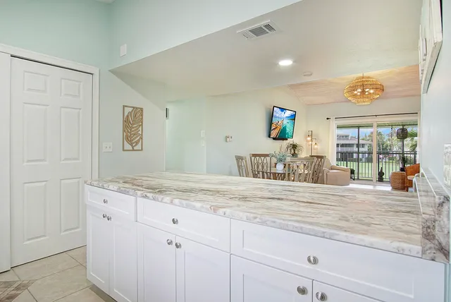 a view of a chairs on the roof deck