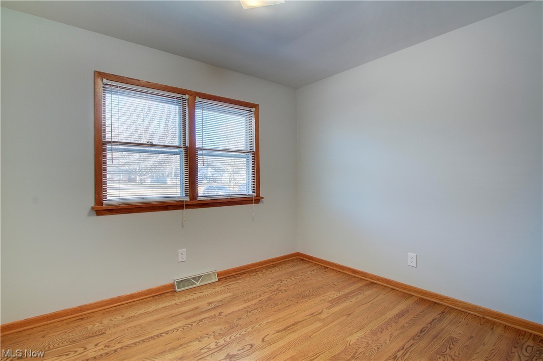 1998 Bridger Road Akron, OH 44312 - Photo 21 of 32 Empty bedroom with light hardwood / wood-style floors