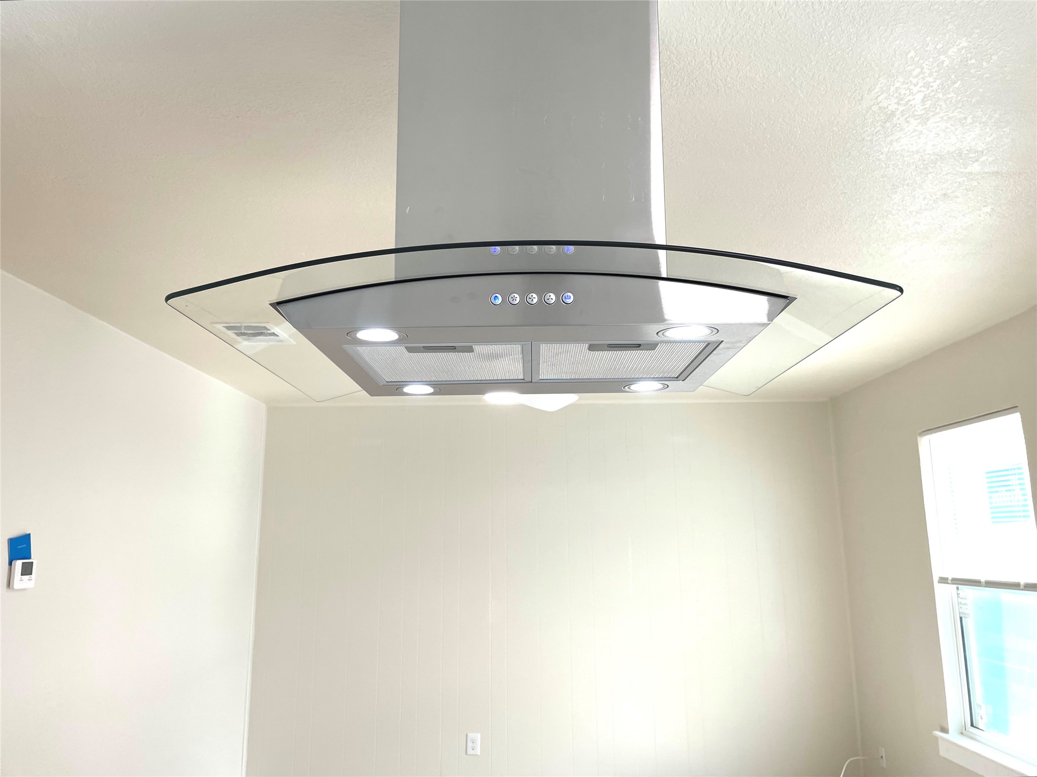 6510 Hickman Avenue, Unit 102 Austin, TX 78723 - Photo 15 of 32 Detailed view of island exhaust hood