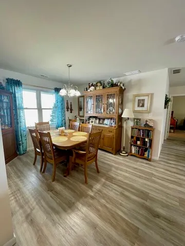 a utility room with sink dryer and washer