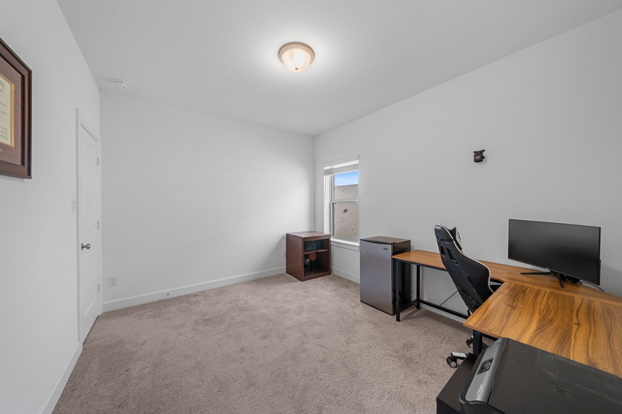 15119 Barbado Ridge Trail Cypress, TX 77433 - Photo 25 of 37 Additional upstairs bedroom designed with comfort and versatility in mind.