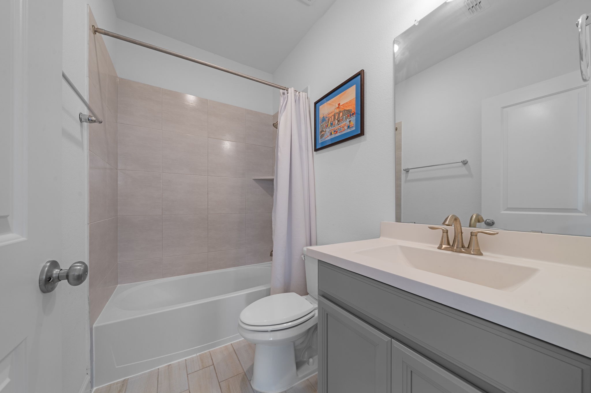 15119 Barbado Ridge Trail Cypress, TX 77433 - Photo 27 of 37 Conveniently located off the game room, the upstairs full bathroom offers a clean and functional space for family and guests.