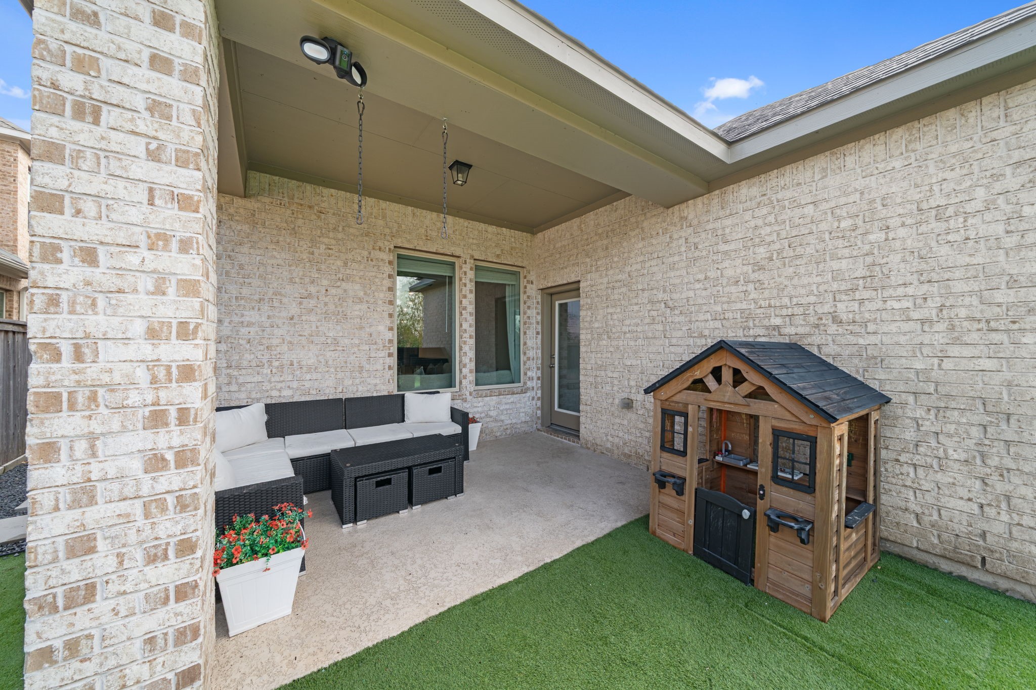 15119 Barbado Ridge Trail Cypress, TX 77433 - Photo 32 of 37 Adjacent to the lawn is a spacious covered patio, offering a shaded retreat for outdoor dining or customize with sectional sofa.