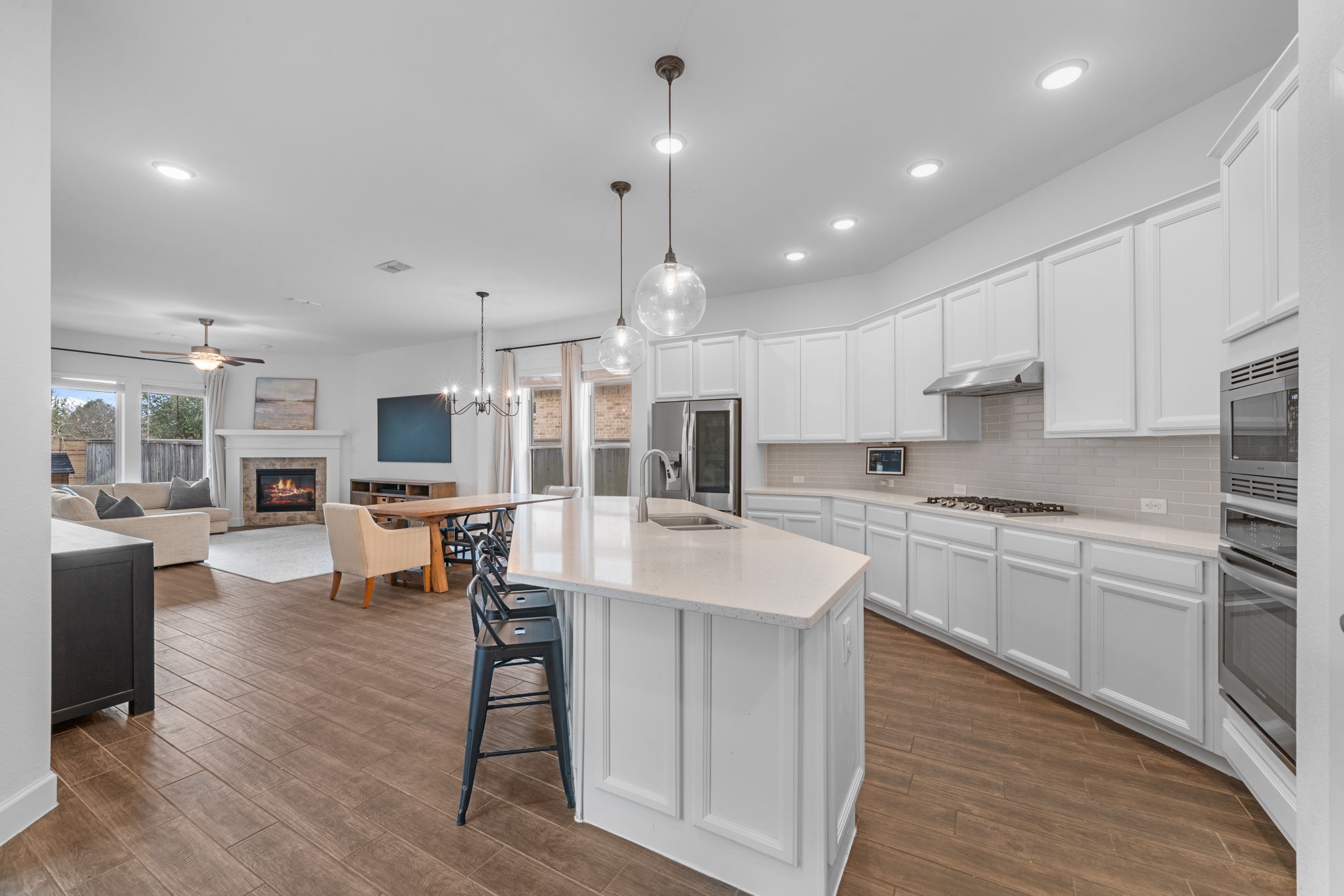 15119 Barbado Ridge Trail Cypress, TX 77433 - Photo 10 of 37 Prepare to be impressed by this sleek, gourmet kitchen that perfectly blends high-end functionality with modern design.