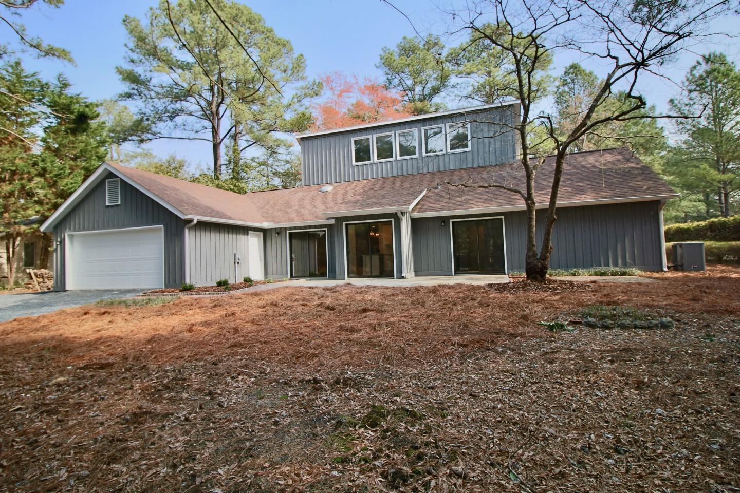 75 Oak Hills Road Pinehurst, NC 28374 - Photo 30 of 33 Garage and backyard