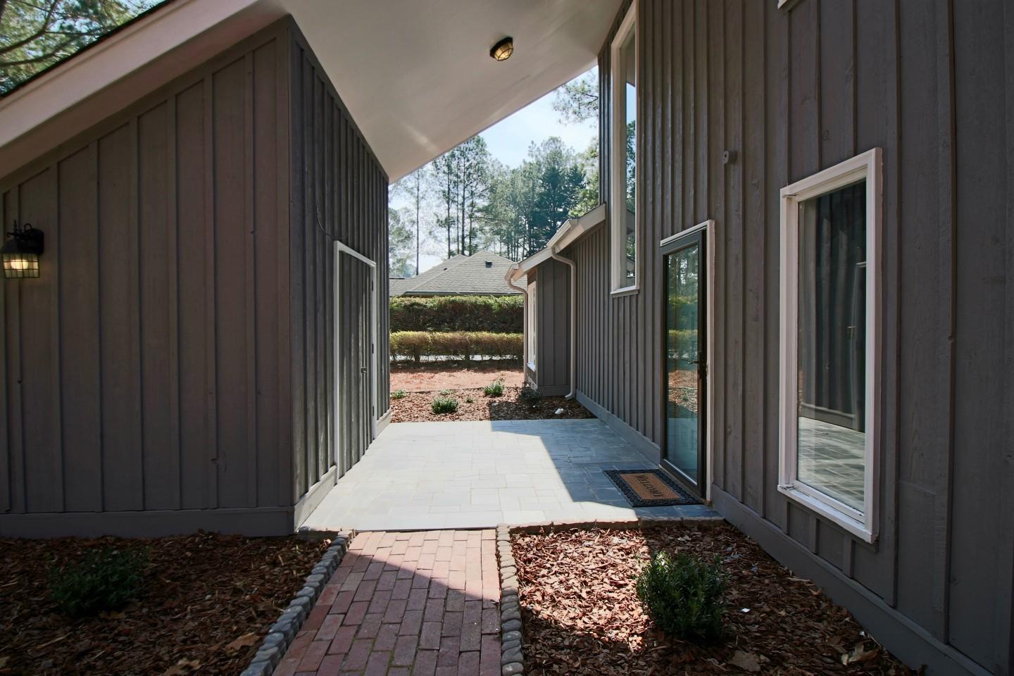 75 Oak Hills Road Pinehurst, NC 28374 - Photo 31 of 33 Front door and shed entry