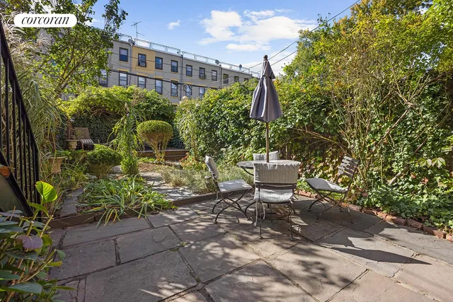 a bathroom with a double vanity sink and mirror
