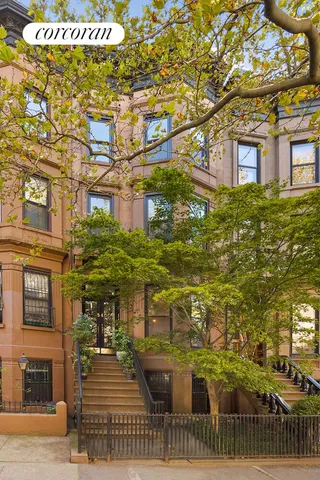 a view of a backyard with sitting area