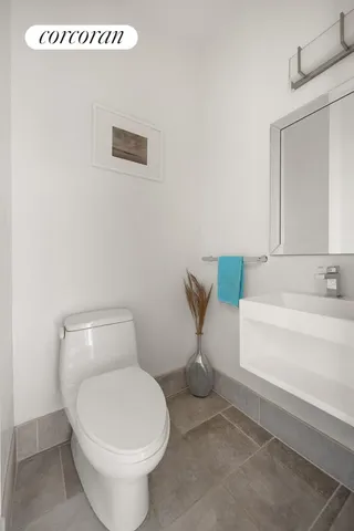 a kitchen with stainless steel appliances granite countertop a stove refrigerator and microwave