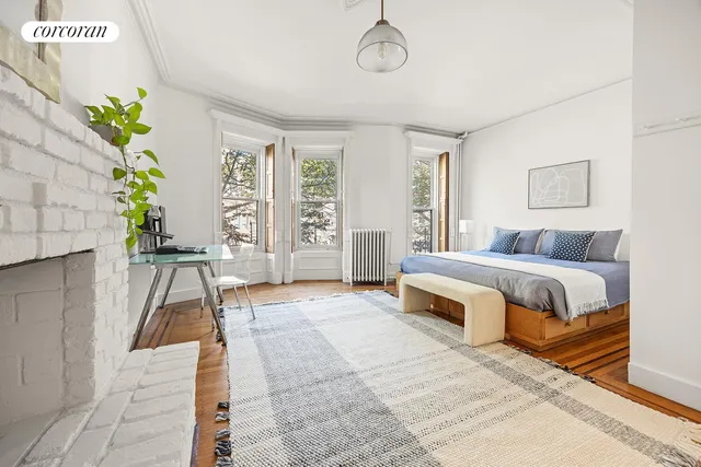 a bathroom with a toilet and a bathtub