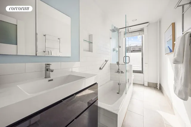 a bedroom with a bed and a table