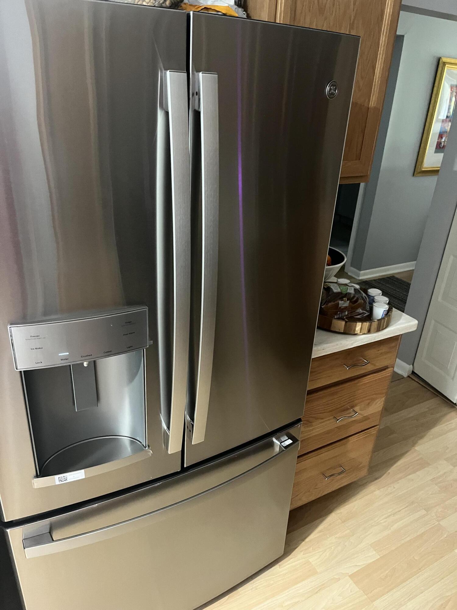 14 Southport Lane, Unit C Boynton Beach, FL 33436 - Photo 14 of 39 a close view of stove and refrigerator