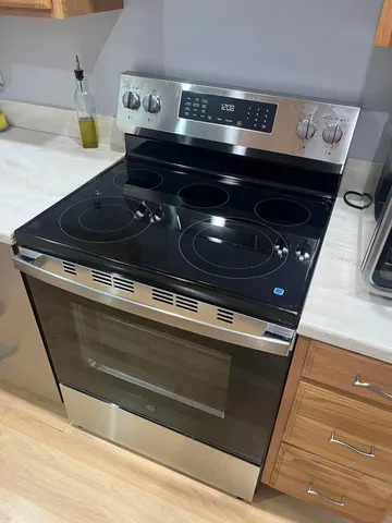 an aerial view of residential houses with outdoor space and swimming pool