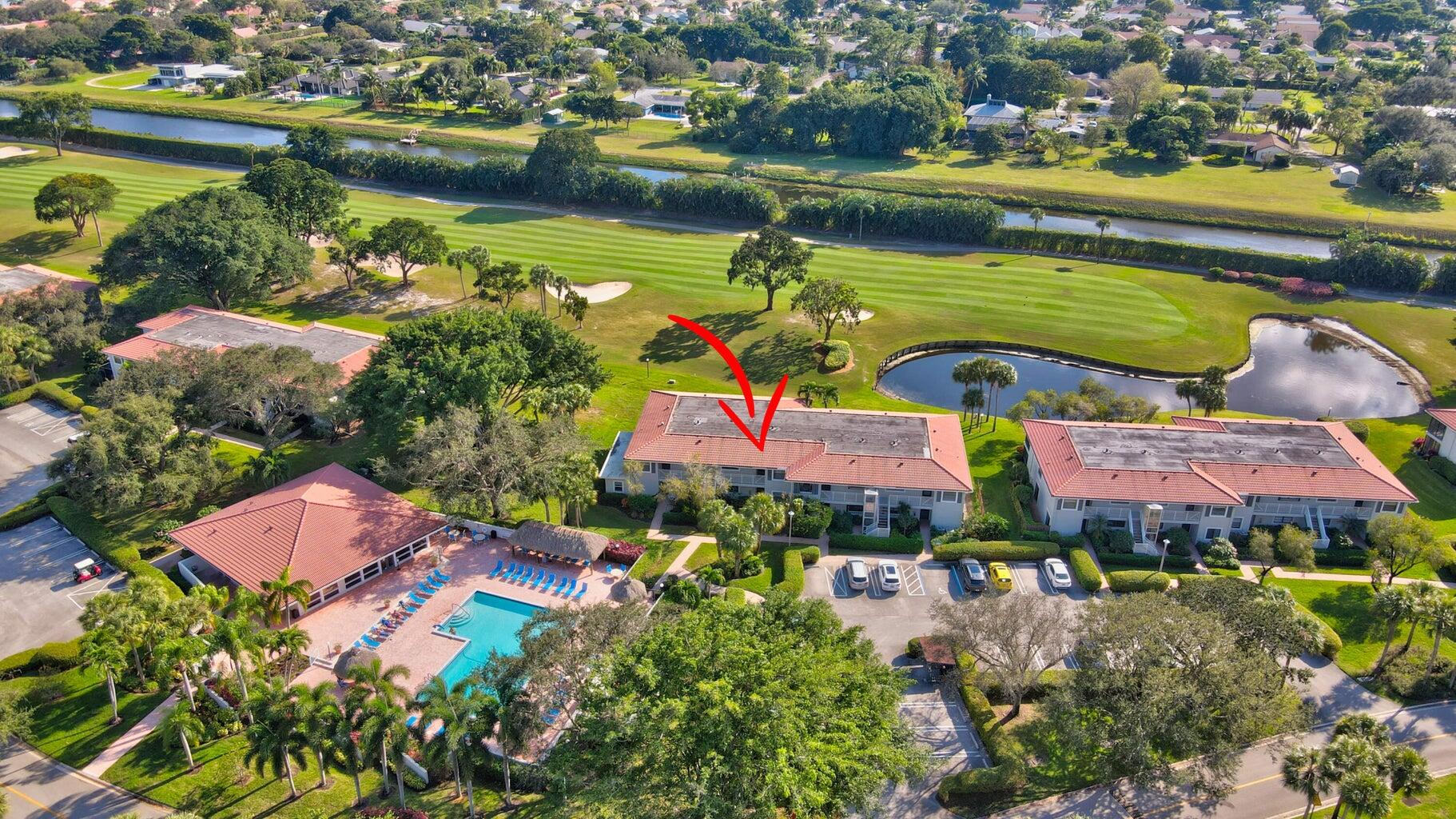 14 Southport Lane, Unit C Boynton Beach, FL 33436 - Photo 16 of 39 an aerial view of residential houses with outdoor space and swimming pool