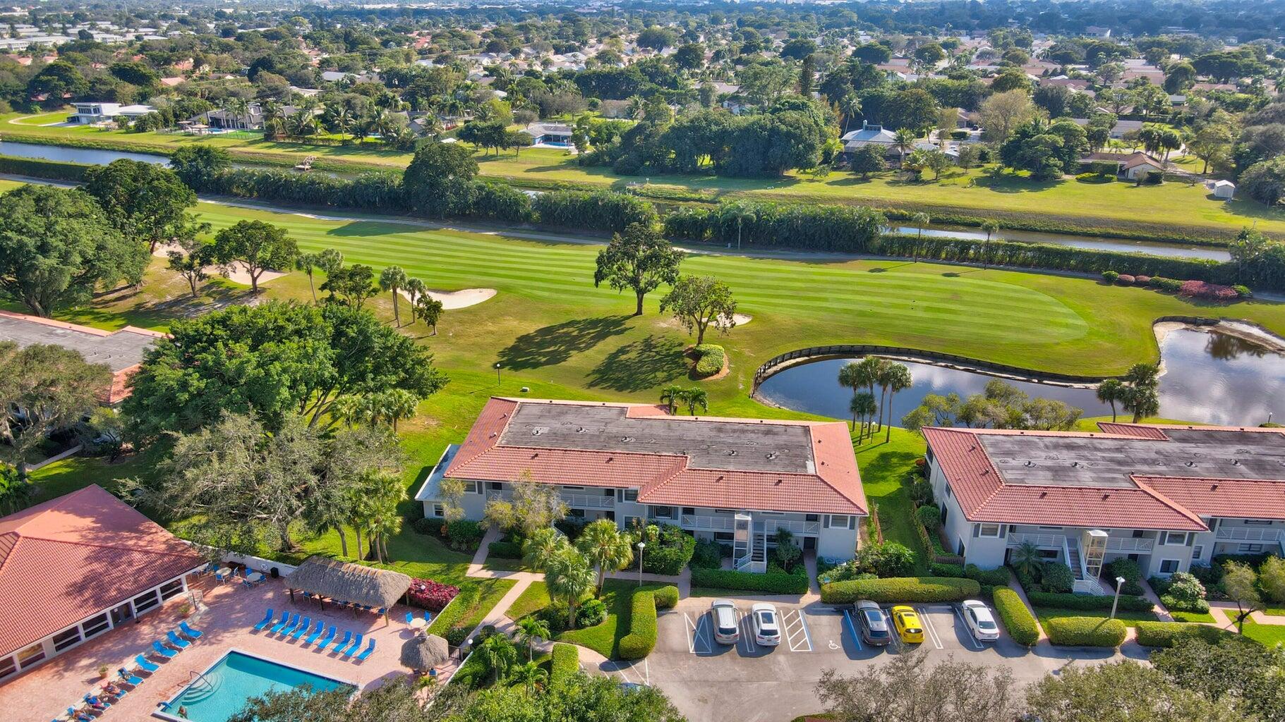 14 Southport Lane, Unit C Boynton Beach, FL 33436 - Photo 17 of 39 an aerial view of a houses with a lake