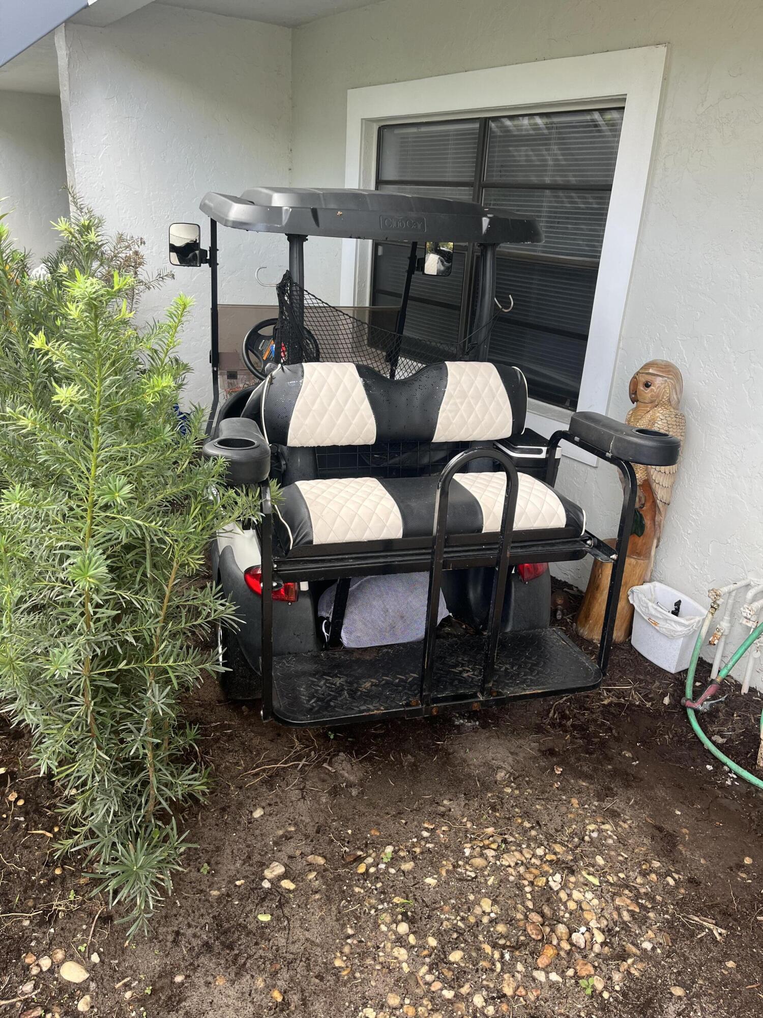 14 Southport Lane, Unit C Boynton Beach, FL 33436 - Photo 39 of 39 a room with furniture and a potted plant
