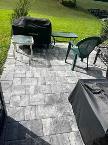 a view of a golf course with a lake