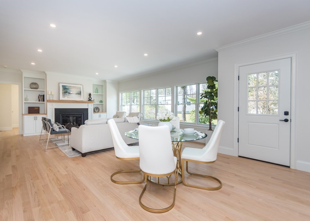 50 Nardone Road Needham, MA 02492 - Photo 12 of 37 a living room with furniture a fireplace and a large window