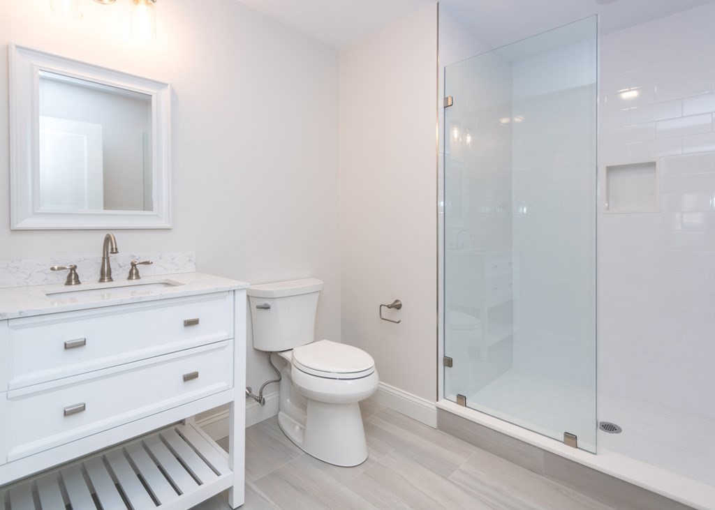 50 Nardone Road Needham, MA 02492 - Photo 28 of 37 a bathroom with a sink a toilet and shower