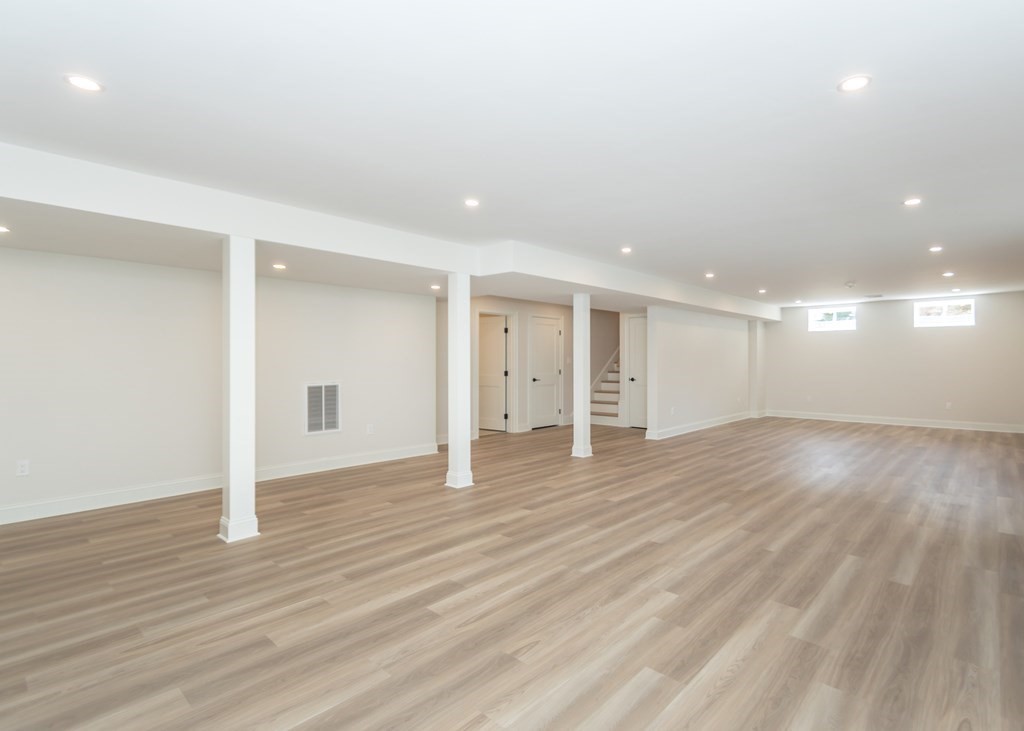 50 Nardone Road Needham, MA 02492 - Photo 29 of 37 a view of an empty room with wooden floor and window