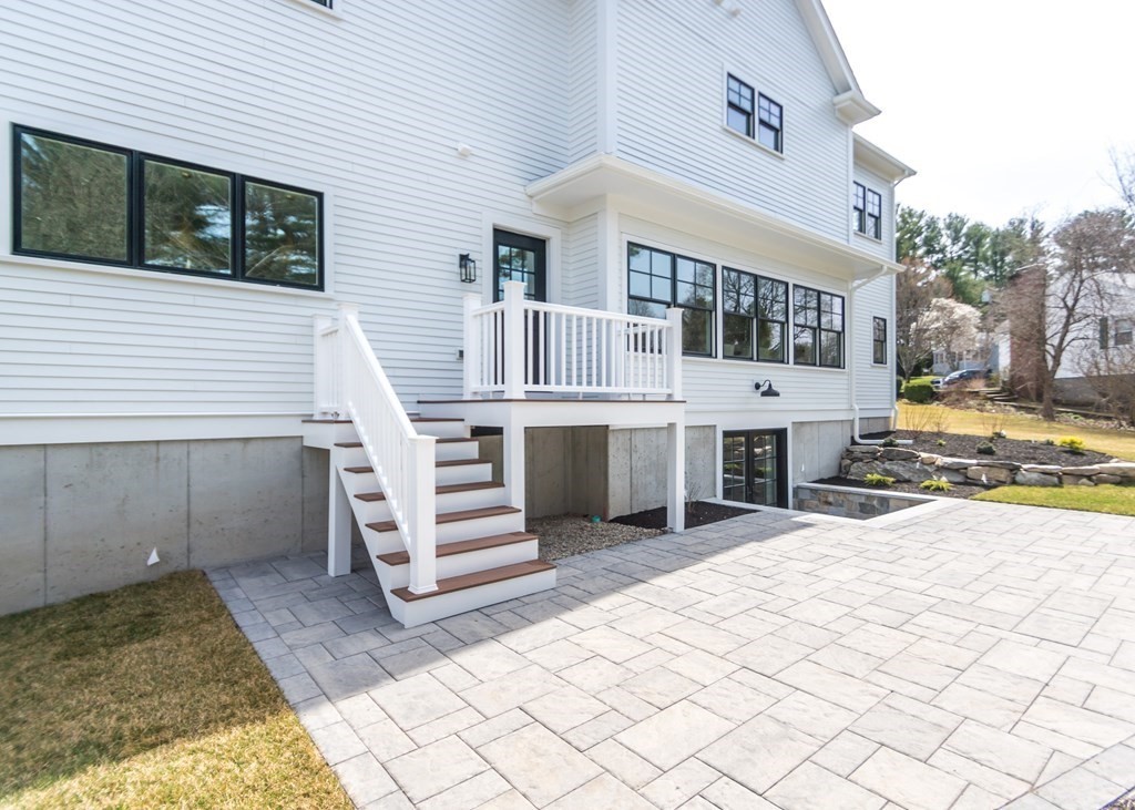 50 Nardone Road Needham, MA 02492 - Photo 32 of 37 a view of a house with a yard