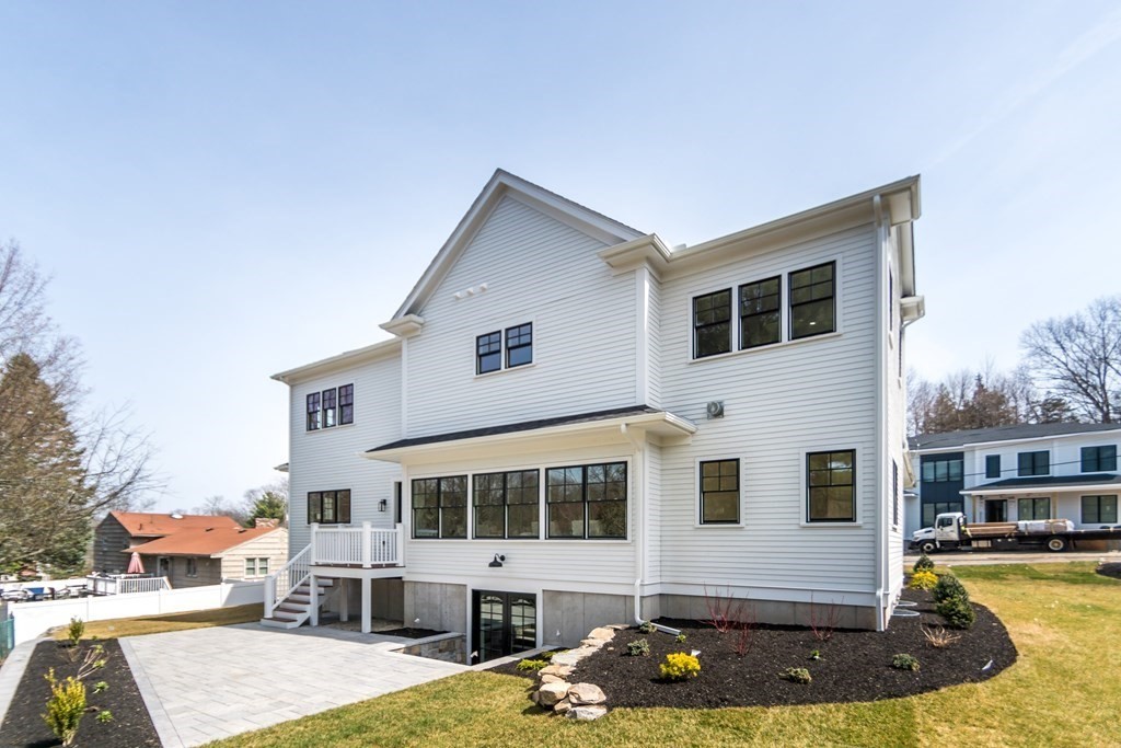 50 Nardone Road Needham, MA 02492 - Photo 34 of 37 a front view of a house with garden