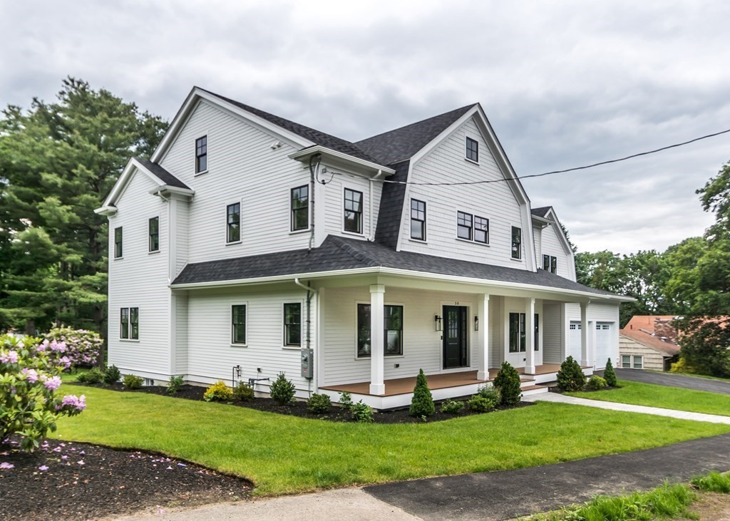 50 Nardone Road Needham, MA 02492 - Photo 36 of 37 a front view of a house with a yard and porch