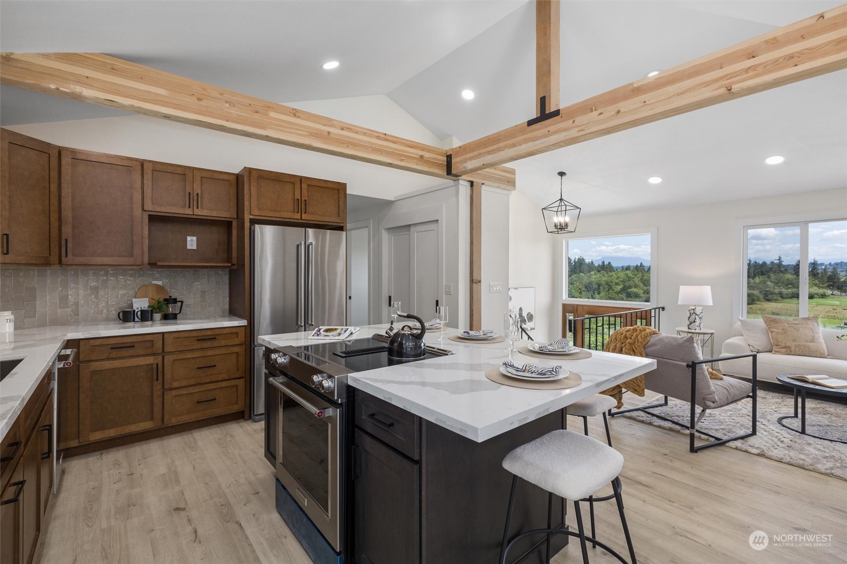 6314 Larimer Road Everett, WA 98208 - Photo 11 of 40 a kitchen with a stove a sink and a refrigerator
